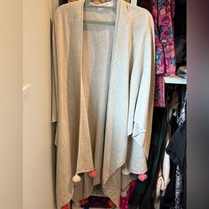 Mer Sea wrap with tassel accents